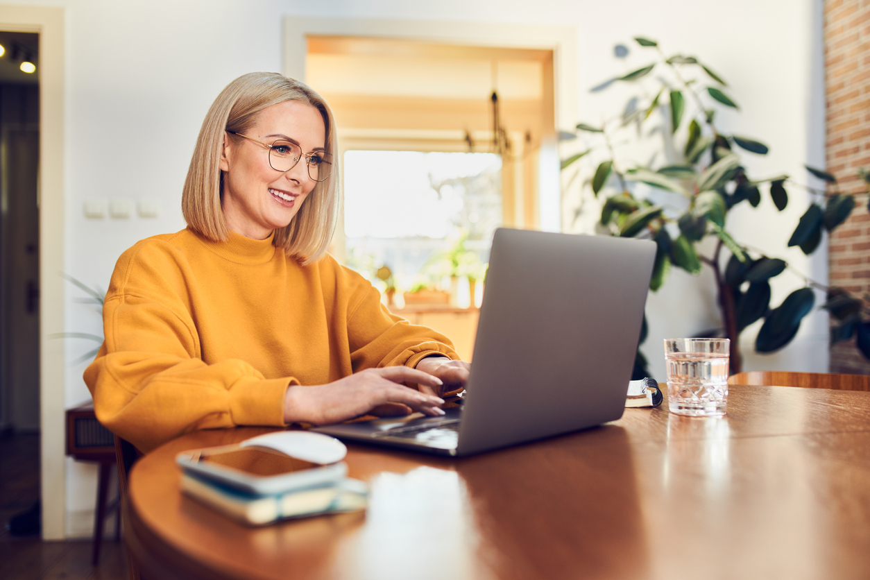 Woman analyzing Social Security retirement benefit start months